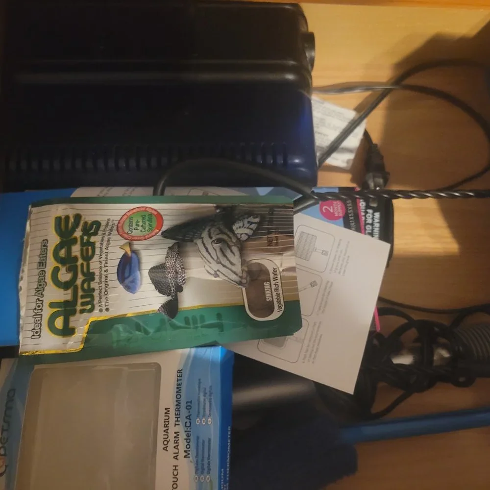 55 gallon fish tank, supplies, and accessories.